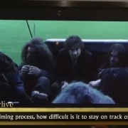Bilbo y los Enanos en el bote de Bardo