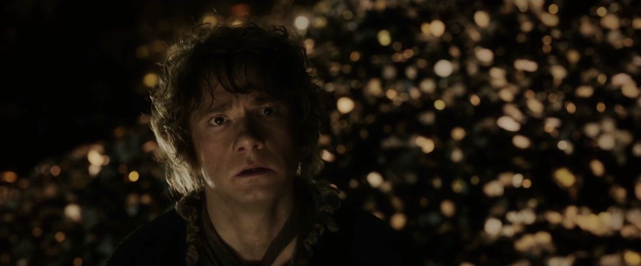 Bilbo aterrorizado por el dragón Smaug