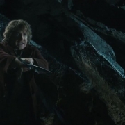 Bilbo desconfía de Gollum